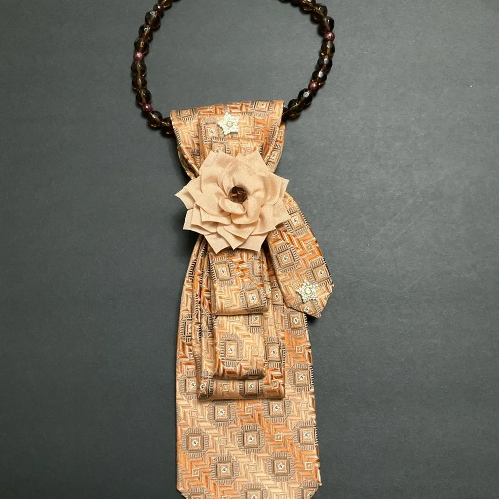 “SOLD” Handcrafted Necktie Necklace with Tan Floral Accent and Brown Beaded - Picture 1 of 5